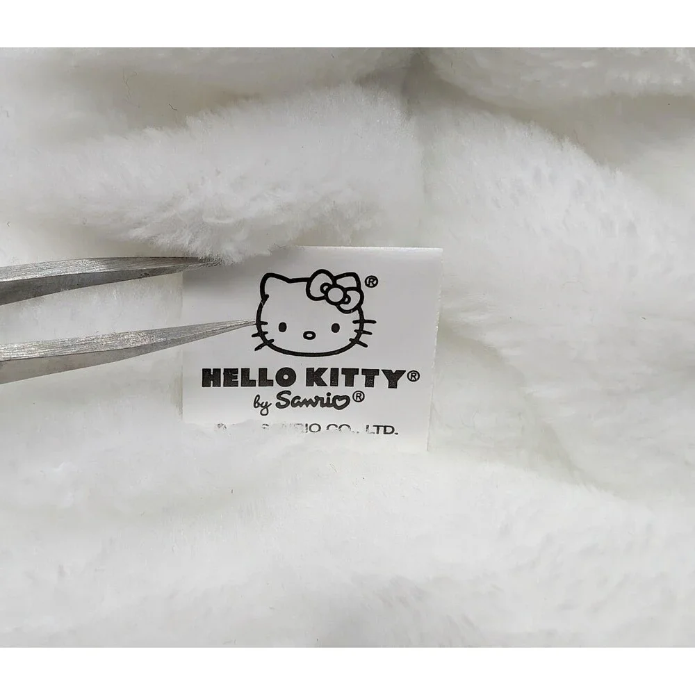the CREME Hello Kitty Halloween Plush Spa Headband with Candy Corn Bow Limited